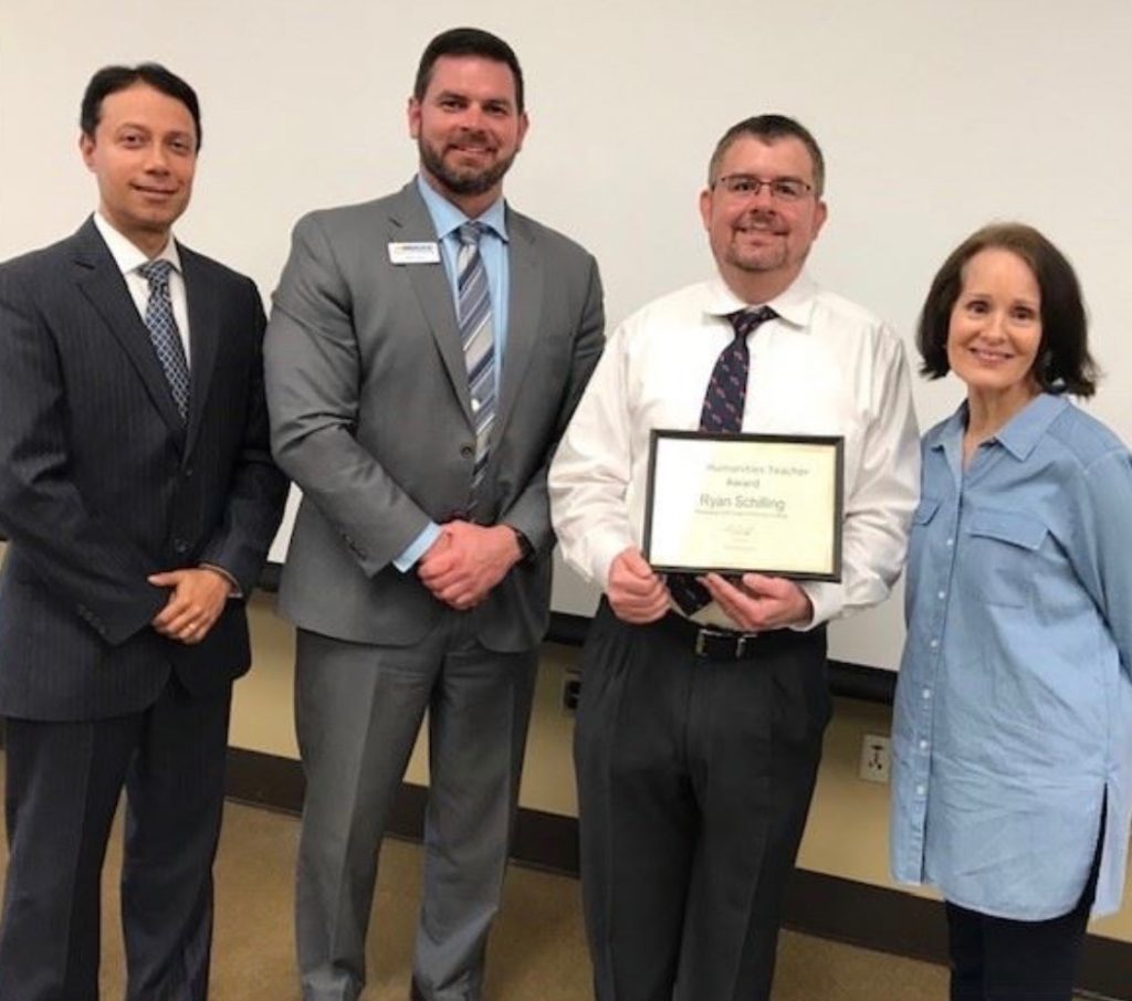 Ryan Schilling, chosen as the 2019 Mississippi Humanities Council Instructor of the Year, presented “The Dangers of Informing: The Suppression of Journalism from a Historical and Contemporary Perspective” on February 7, 2019, at MGCCC’s Perkinston Campus.  From left are Dr. Bobby Ghosal, dean of Teaching and Learning, Perkinston Campus; Dr. Ladd Taylor, vice president of the Perkinston Campus; Ryan Schilling; and Marie Paslay, Social Studies department chair.