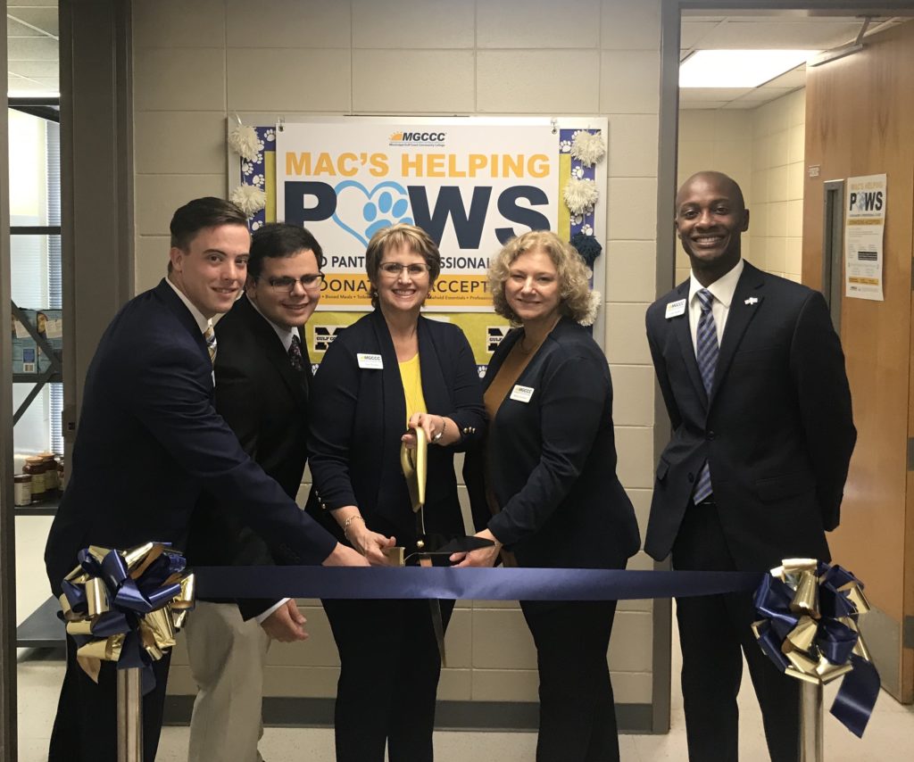 From left are Terrell Jordan, Student Government Association president, Quentin Boccaleri, Student Government Association vice president; Dawn Buckley, director of Enrollment Services; Monica Donahue, social studies department chair; and Dr. Cedric Bradley, vice president of the Jefferson Davis Campus.