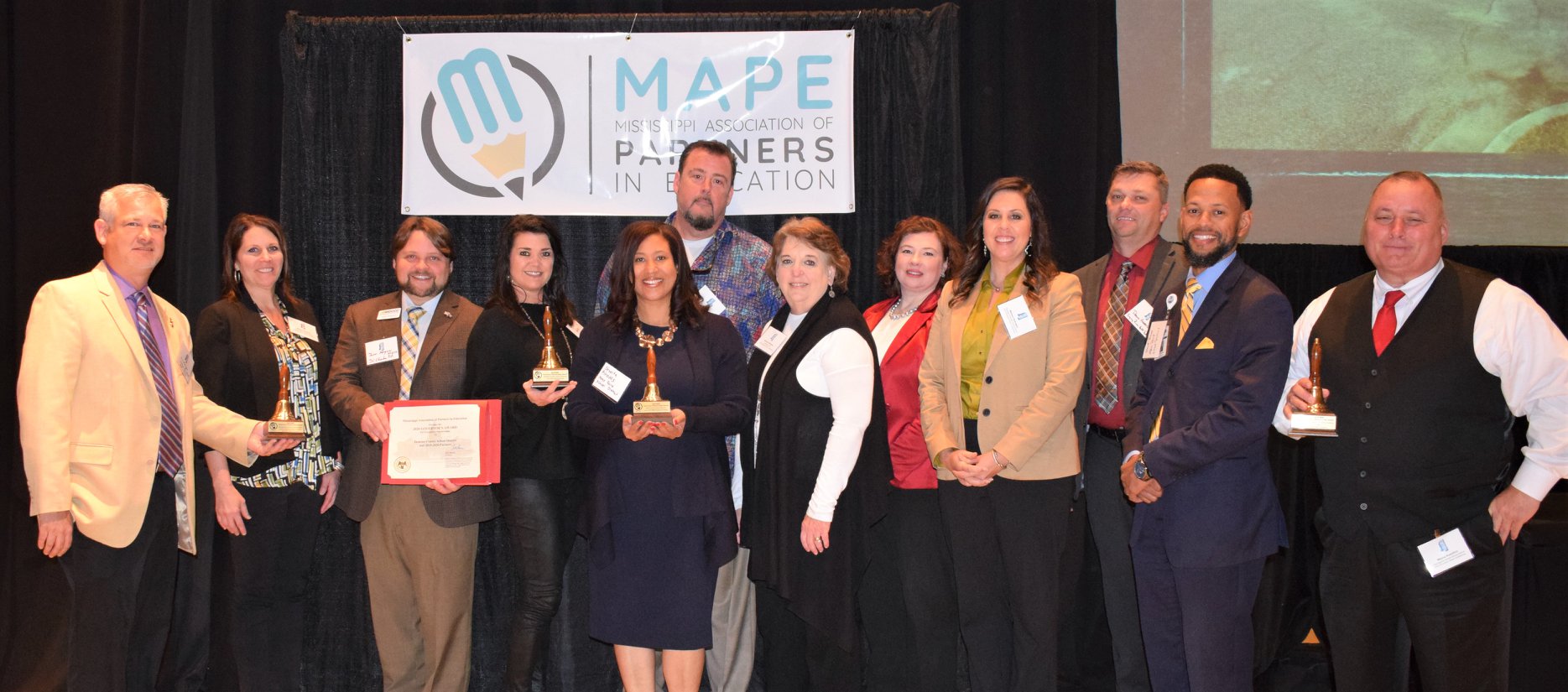 Group of individuals from companies and schools in Jackson County at annual MAPE awards ceremony