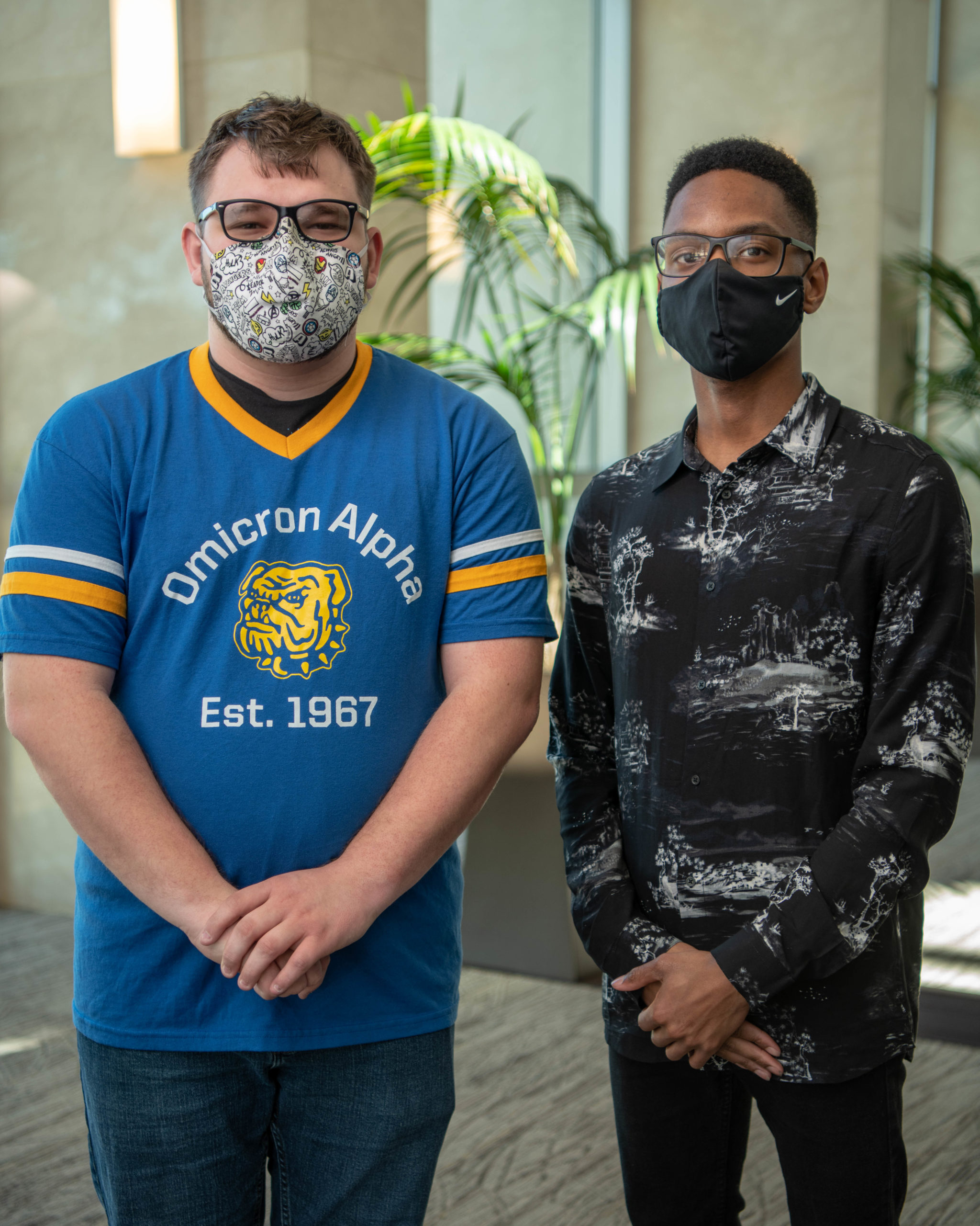 Two students standing in MGCCC's HRM building