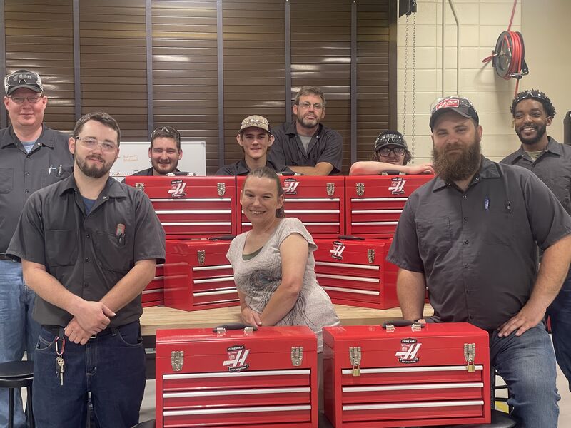 Jamie Wilkerson, Precision Manufacturing and Machining Technology instructor at Mississippi Gulf Coast Community College’s Jackson County Campus, stands at center with students in her program that received toolboxes this past May. Students received the toolboxes filled with tools as part of a $10,000 scholarship from the Gene Haas Foundation. 