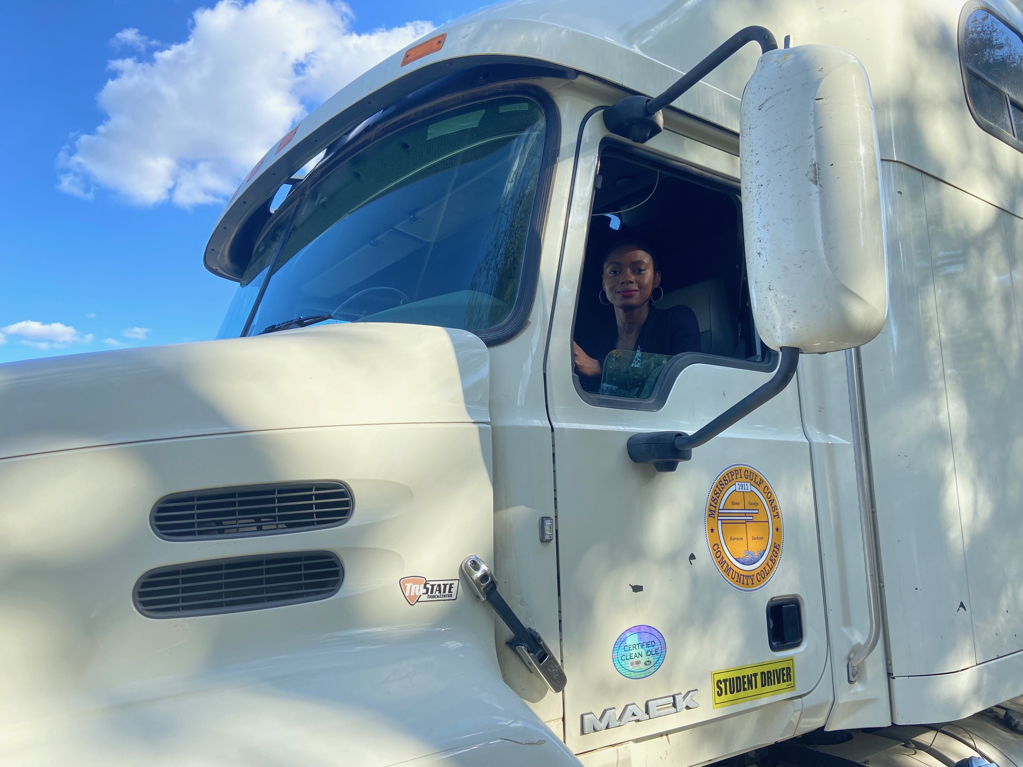 Nicole Harrison sitting in the MGCCC big rig truck at the George County Center