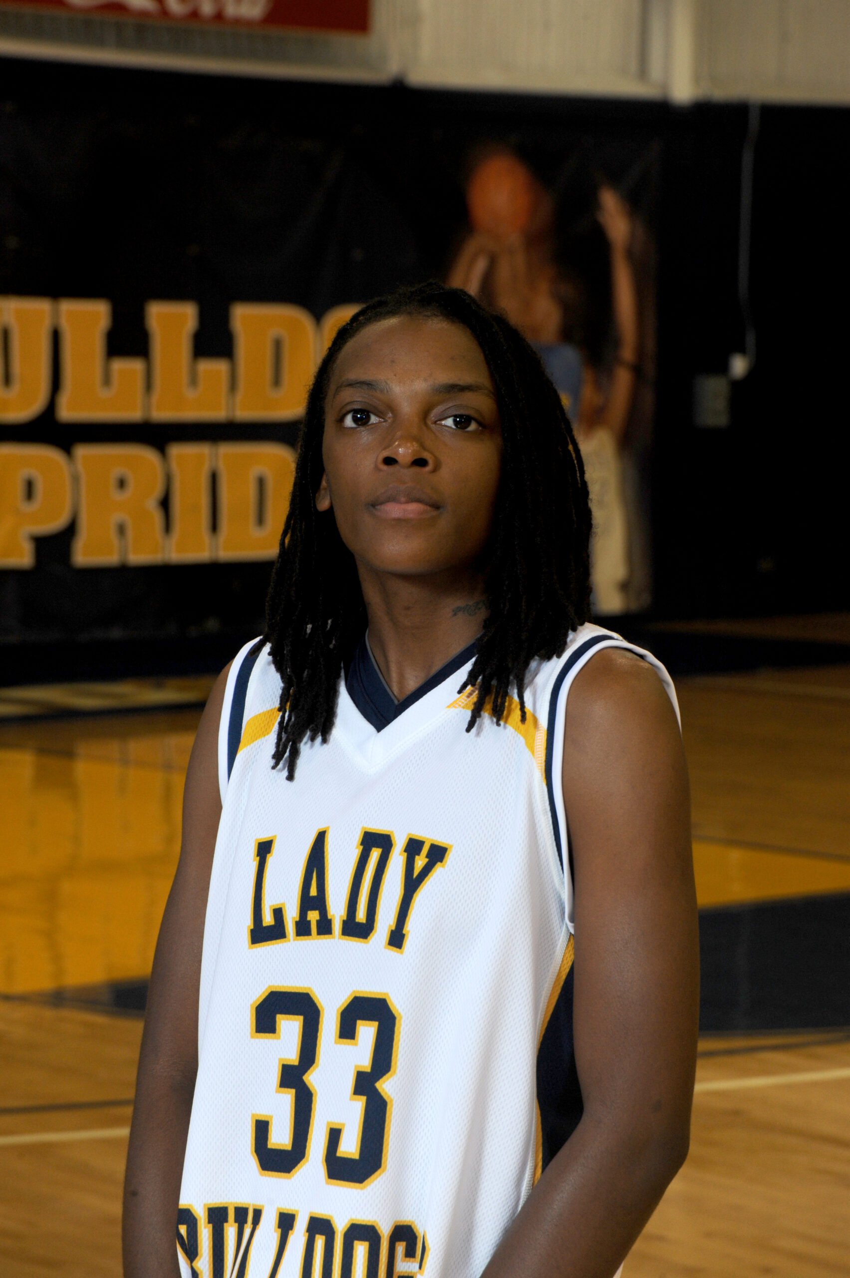Deonica McCormick's portrait from 2010 in basketball uniform.