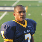 Don Jones II portrait on football field in uniform