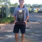 Colby Entriken holding the national trophy