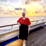 Mary Gregory on a boat at sunset