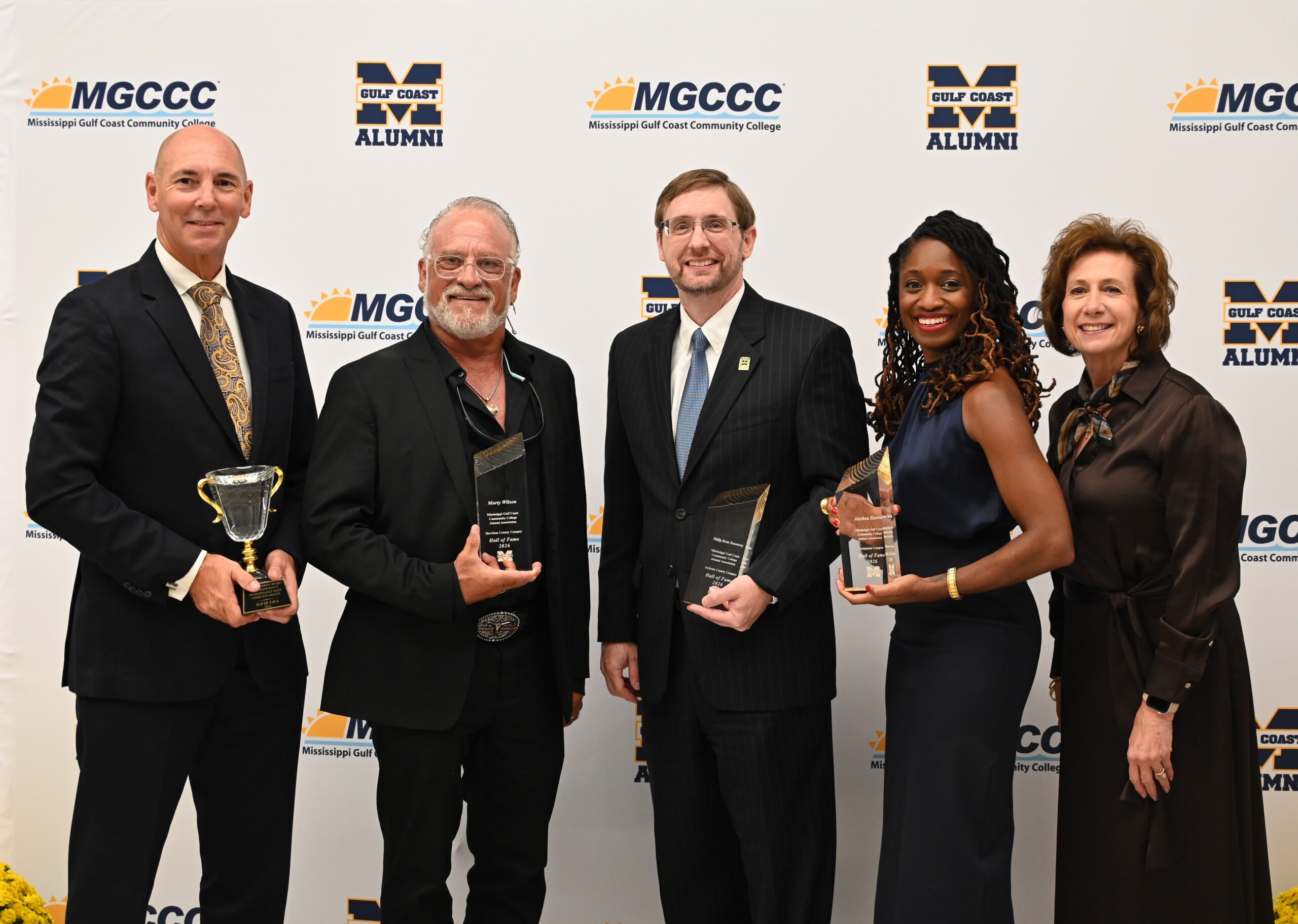 Alumni Hall of Fame Honorees: From left are Sam Owen Award honoree David Fava, Harrison County Campus Alumni Hall of Fame honoree Marty Wilson, Jackson County Campus Alumni Hall of Fame honoree Phillip Brent Dunnaway, Perkinston Campus Alumni Hall of Fame honoree Aleshea Harris and MGCCC President Dr. Mary S. Graham.